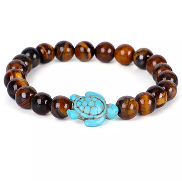 Bracelet en Oeil de Tigre de Madagascar 6mm + tortue Amérindienne en Howlite Turquoise