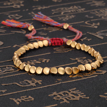 Bracelet de chance en perles de cuivre - façon Bouddhisme Tibétain