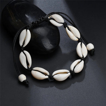 Chaîne de cheville noire en coquillages cauris naturels