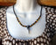 Collier Africain rasta en bois pendentif en os de buffle gravé - Artisanat du Sénégal