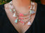 Collier multirangs bohème boho gipsy avec pompons et perles