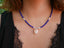 Collier en perles et coquillage cauri naturel