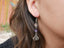 Boucles d'oreille Fleur de Lotus en Améthyste Chevron et Cristal de Roche