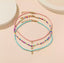 Ensemble de 3 colliers en perles. Vert d’eau, multicolore et rose