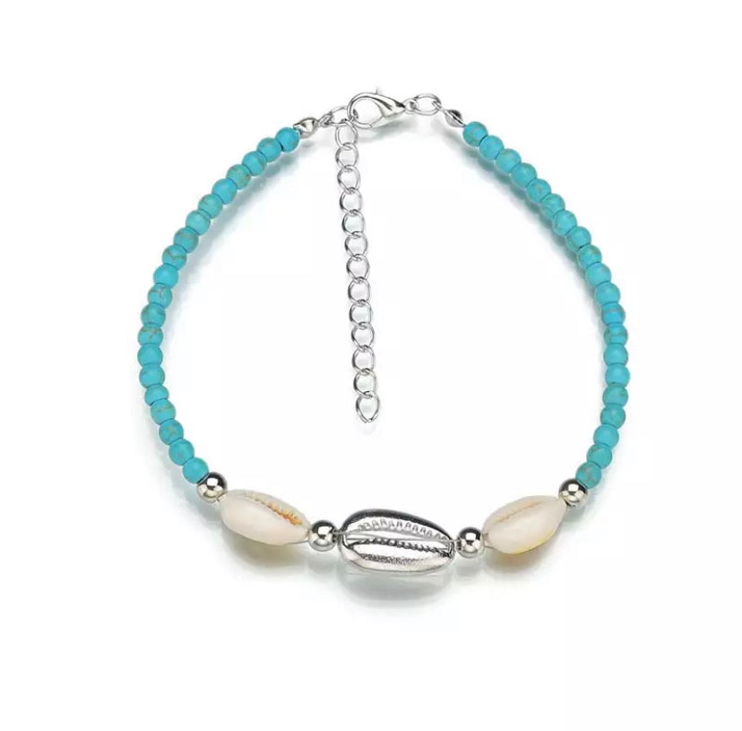 Chaîne de cheville coquillage cauri argenté et perles en howlite turquoise