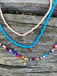 Ensemble de 3 colliers en perles. Turquoise, multicolore et rose