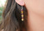 Boucles d'oreilles pendantes en Grenat et Citrine