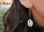 Boucles d'oreilles forme créole en coquillages cauris