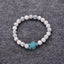 Bracelet en pierre véritable Howlite Blanche 6 mm + tortue Amérindienne en Howlite Turquoise