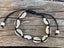 Chaîne de cheville noire en coquillages cauris naturels